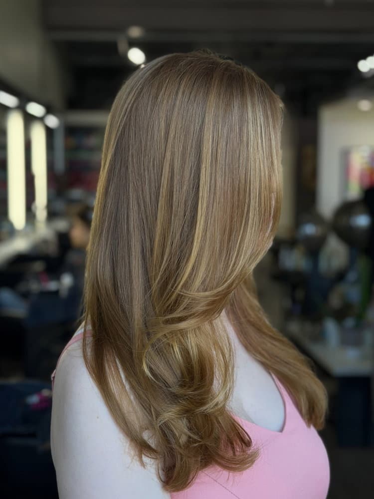 A stunning long layered haircut done by the fabulous Taylor Such a gorgeous look