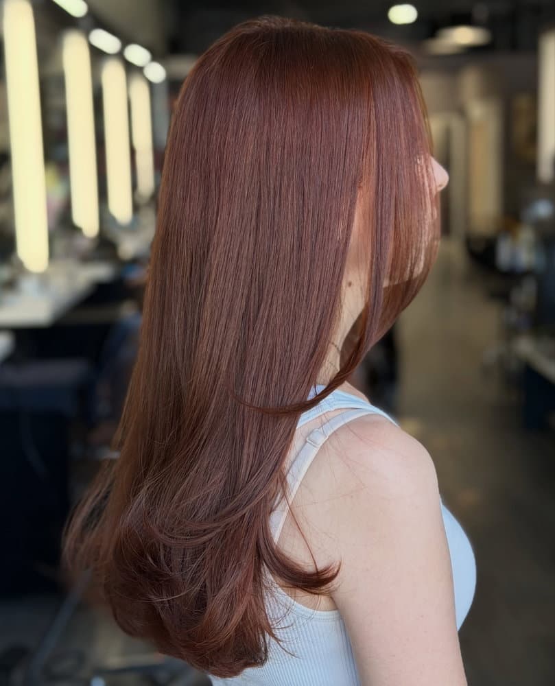Beautiful dark auburn hair done by our stylist Taylor The brown with red undertones looks so stunning and is just want the client wanted